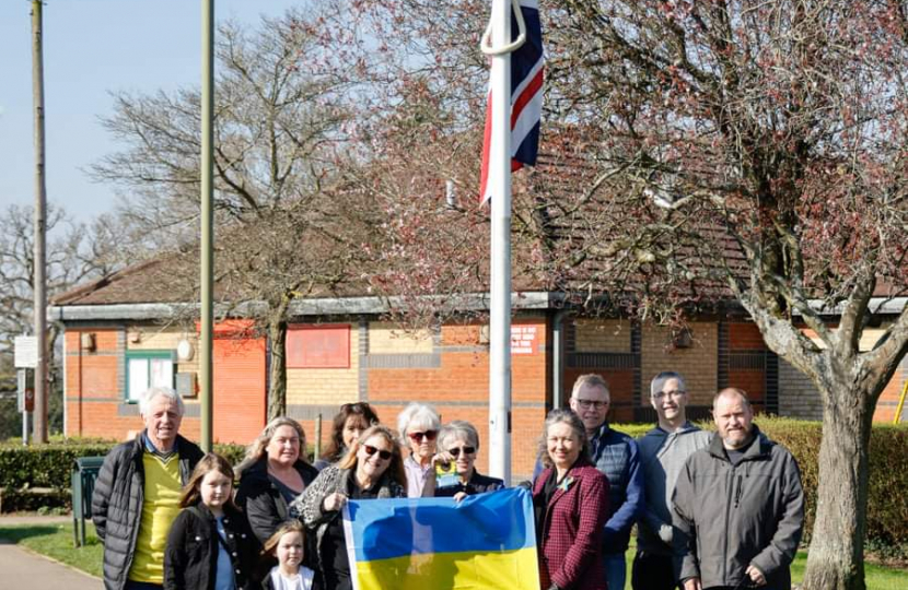 Local Conservative volunteers with the Ukraine flag